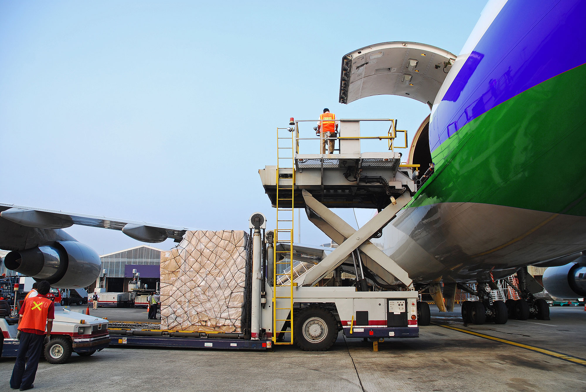 Airplane with cargo being loaded